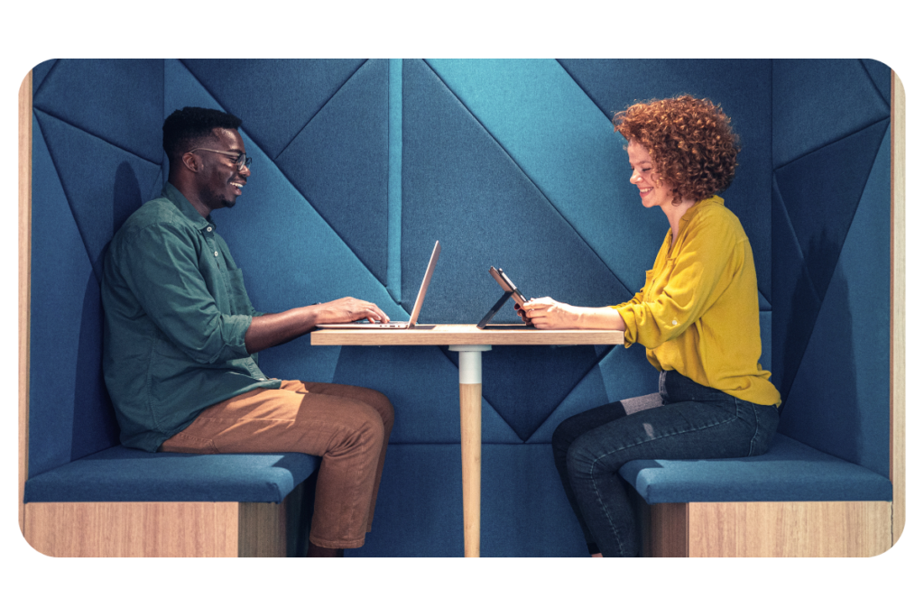 Lady and man using laptop devices